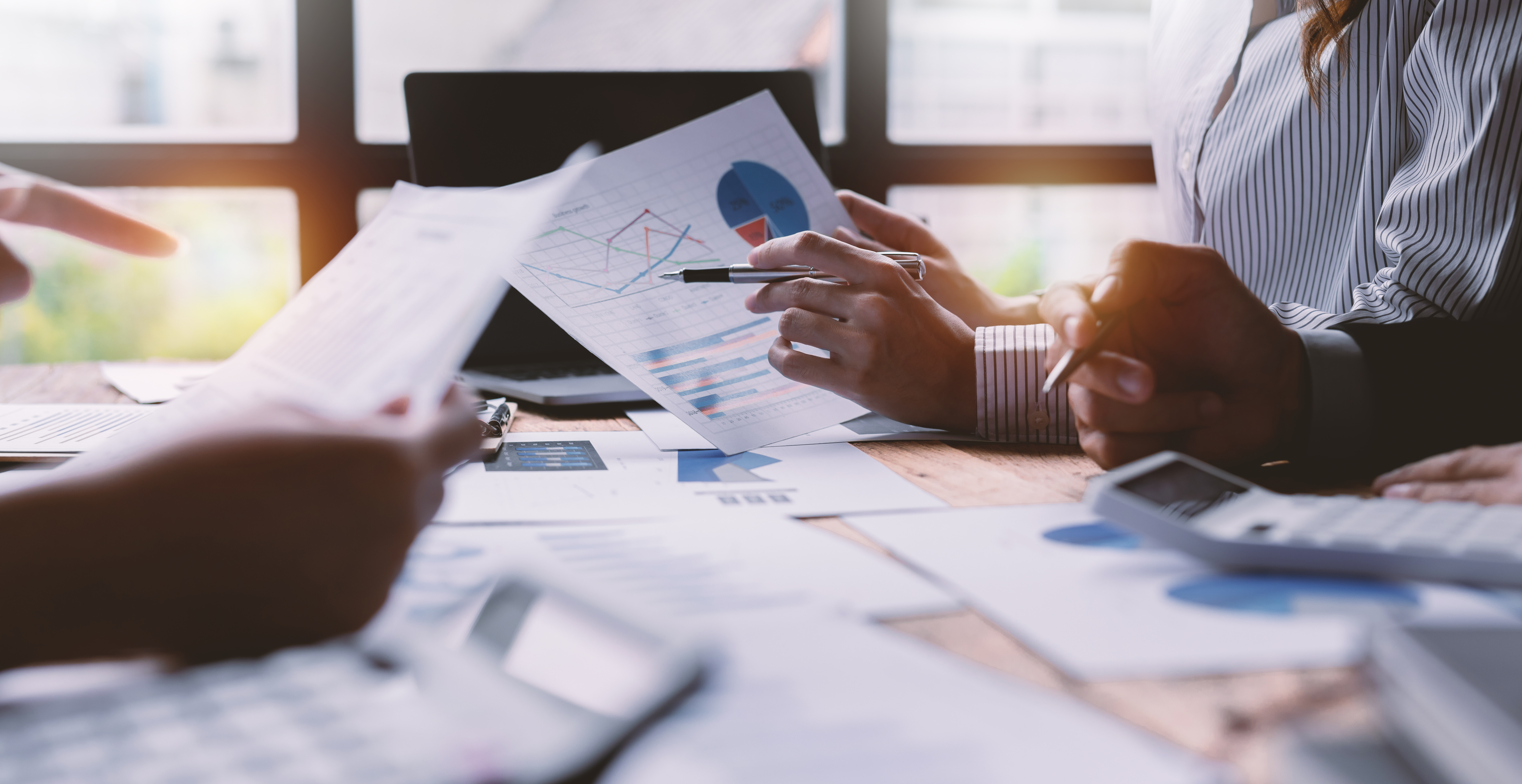 group of confident business people point to graphs 2026 01 08 05 48 26 utc 2