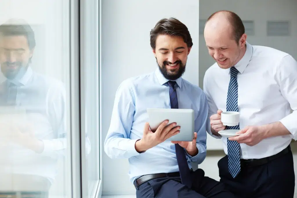 executive showing new project digital tablet