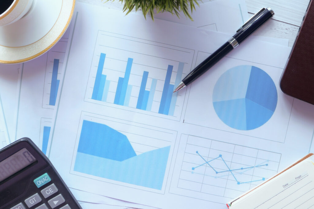 financial graph calculator and notepad on table 2026 01 06 11 09 40 utc