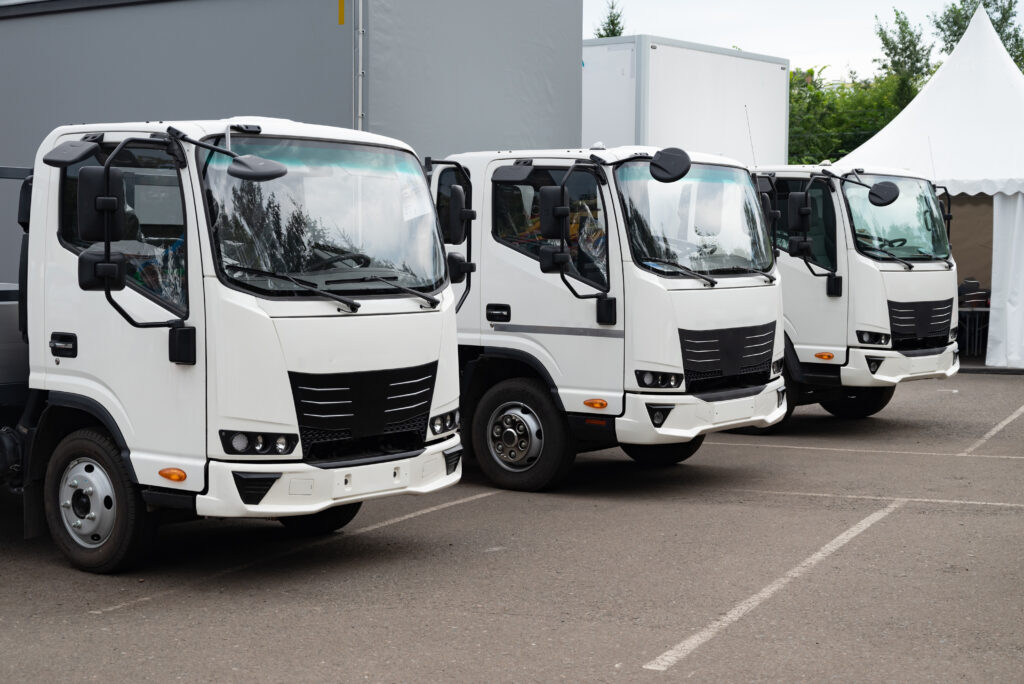 three white trucks parked in a row 2026 03 25 09 20 51 utc